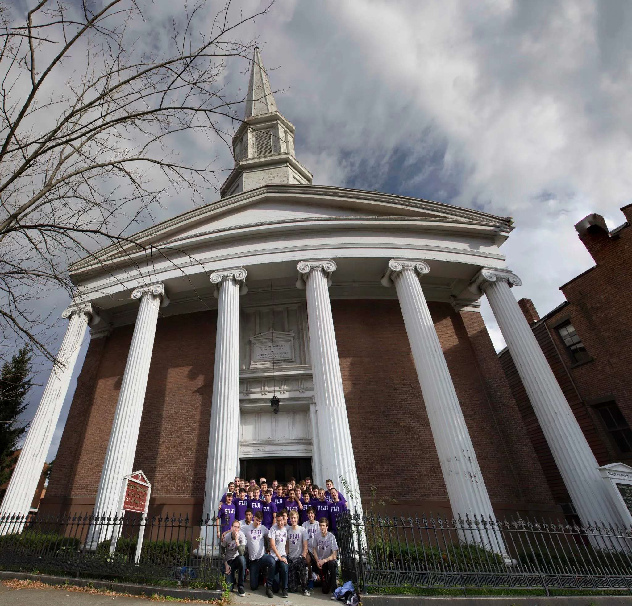 Brothers gathered in front of the chapter house